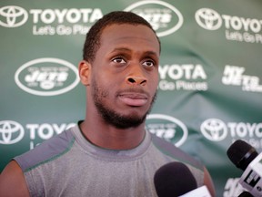 In this Aug. 4, 2015, file photo, New York Jets quarterback Geno Smith responds to questions during a news conference after practice at NFL football  training camp in Florham Park, N.J. Jets quarterback Geno Smith will be sidelined at least 6-10 weeks after being punched in the jaw by teammate Ikemefuna Enemkpali. Coach Todd Bowles made the announcement before training camp practice Tuesday, Aug. 11, 2015. (AP Photo/Frank Franklin II, File)