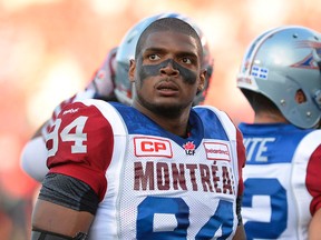 In this Aug. 7, 2014, file photo, Montreal Alouettes' Michael Sam and teammates warm up for a Canadian Football League game against the Ottawa Redblacks in Ottawa, Ontario. (Justin Tang/The Canadian Press via AP, File)