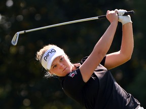 Brooke M. Henderson, of Canada, hits her tee shot on the second hole during the final round of the Cambia Portland Classic golf tournament in Portland, Ore., Saturday, Aug. 16, 2015. (AP Photo/Steve Dykes)