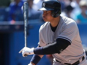 Yankees’ Alex Rodriguez looks rather humbled at the plate facing the Blue Jays yesterday at the Rogers Centre. (Craig Robertson/Toronto Sun)