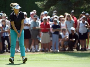 Brooke Henderson of Canada reacts to sinking her birdie putt on the eighth hole during the final round of the Cambia Portland Classic golf tournament in Portland, Ore., Sunday. (Steve Dykes/The Associated Press)
