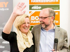 Premier Rachel Notley gets a hug from NDP candidate Bob Hawkesworth during the recent provincial byelection. Hawkesworth has been named the executive director of the McDougall Centre in Calgary. Lyle Aspinall/Calgary Sun/Postmedia Network