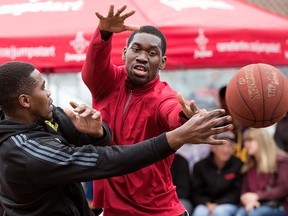 Players participate in the Pride of the Northside 4-on-4 hoops tourney on Sunday. (DAVID BLOOM/Edmonton Sun)