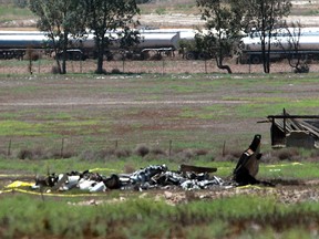 Authorities say multiple people died following the midair collision and crash of two small planes near an airport in southern San Diego County. Federal Aviation Administration spokesman Ian Gregor says the collision occurred around 11 a.m. Sunday, Aug. 16, 2015, about 2 miles northeast of Brown Field Municipal Airport. (John Gastaldo/U-T San Diego via AP)
