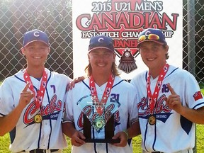 Tyler Pauli (left), Barry Eidt and Derek Elliott, all of Mitchell and area and members of the New Hamburg/Stratford Cubs, pose with their U21 Junior Men’s Softball Canadian championship medals after they went undefeated in the week-long tournament in Napanee. SUBMITTED