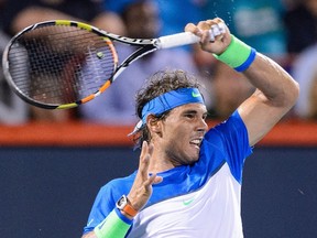 Rafael Nadal of Spain hits a return against Kei Nishikori of Japan during the Rogers Cup at Uniprix Stadium in Montreal on August 14, 2015. (Minas Panagiotakis/Getty Images/AFP)