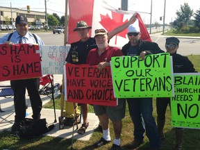 Veterans and their advocates gathered on John Counter Boulevard for a protest in front of the Veteran's Affairs Canada office in Kingston, Ont. on Monday, Aug 17, 2015. Elliot Ferguson/Kingston Whig-Standard/Postmedia Network