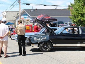 Some of the many cars that were on display throughout the day Saturday during Summerfest at the Ice Hut Bar and Grill.