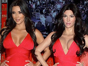 Kim Kardashian in an iconic Herve Leger at her wax figure unveiling held at Madame Tussauds in Times Square New York City. (Mr Blue/WENN.com)