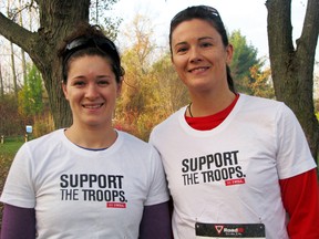 Kitchener residents Brittany Paton, left, and Marissa Ziliani before their five-kilometre run at the Canadian Cancer Society's Cool Runnings event at Roth Park in 2014. (Sentinel-Review file photo)