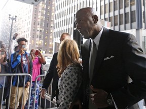 Basketball Hall of Famer Michael Jordan arrives at the federal courthouse in Chicago on Aug. 18, 2015. (AP Photo/Christian K. Lee)
