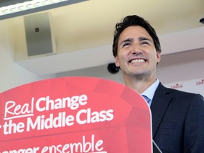 Liberal Leader Justin Trudeau smiles as he answers questions during a campaign stop in Sudbury, Ont.,on Tuesday, August 18, 2015. THE CANADIAN PRESS/Gino Donato