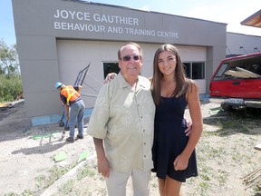 Jim Gauthier (left) gave $1 million to build a new wing of the Winnipeg Humane Society, the Joyce Gauthier Behaviour and Training Centre, Tuesday, Aug. 18, 2015.  Jim is pictured here with his granddaughter Camryn Gauthier.