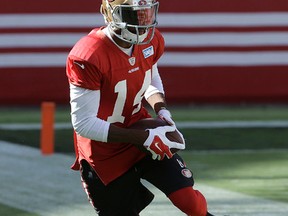Wide receiver Jerome Simpson runs during the 49ers training camp in Santa Clara, Calif., on Aug. 2, 2015. Simpson was suspended six games by the NFL for violations of the league's substance-abuse policy on Aug. 18. (Jeff Chiu/AP Photo)
