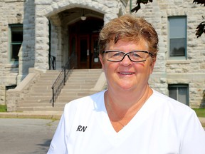 Linda Haslam-Stroud, president of the Ontario Nurses Association, in front of Providence Care's St. Mary's of the Lake site in Kingston on Tuesday. (Ian MacAlpine/The Whig-Standard)