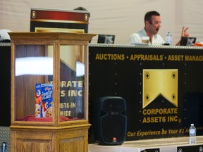 The last box of cereal made at the London Kellogg's plant, a box of Frosted Flakes was sold for $3,000 US as three days of auctions start at the Kellogg's plant in London on Tuesday. (MIKE HENSEN, The London Free Press)