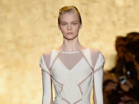 A model walks the runway at the Herve Leger By Max Azria fashion show during Mercedes-Benz Fashion Week Fall 2015 at The Theatre at Lincoln Center on February 14, 2015 in New York City.  (Fernanda Calfat/Getty Images for Mercedes-Benz Fashion Week/AFP)