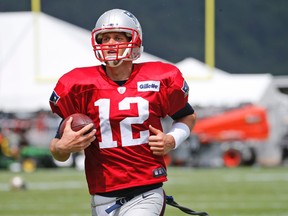 Patriots QB Tom Brady runs a drill during a joint practice between New England and New Orleans Saints in White Sulphur Springs, W.Va., on Wednesday, Aug. 19, 2015. (Steve Helber/AP Photo)