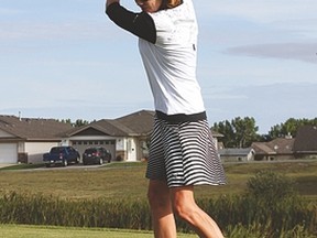 Lorraine Marshall gets ready to tee off on No. 11 at the Vulcan Golf and Country Club during the club’s championships, held Aug. 15-16. Derek Wilkinson Vulcan Advocate