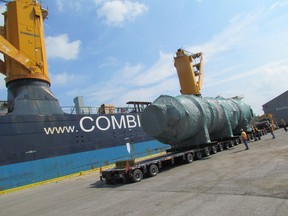 A waste heat exchanger was unloaded at Sarnia Harbour on Wednesday August 19, 2015 in Sarnia, Ont. The vessel, manufactured in South Korea, is being delivered to the Styrolution plant on Tashmoo Avenue as part of a $30-million spring 2016 maintenance turnaround.  (Paul Morden, The Observer)