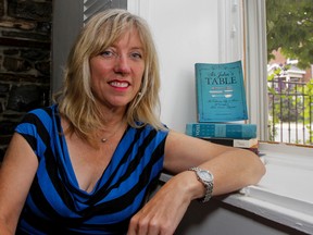 Author Lindy Mechefske, at her home in Kingston, is taking her love of Kingston, food and social history and combining them in her new book, Sir John's Table, which will be published Sept. 1. (Julia McKay/The Whig-Standard)