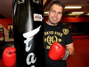 Local writer Chris Olech at Adrenaline Training and Fitness Centre in London Ont. August 18, 2015. Olech’s first book, The Fighter Within, comes out in February. CHRIS MONTANINI\LONDONER\POSTMEDIA NETWORK
