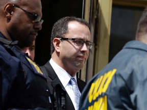 Former Subway pitchman Jared Fogle leaves the Federal Courthouse in Indianapolis, Wednesday, Aug. 19, 2015 following a hearing on child-pornography charges. (AP Photo/Michael Conroy)