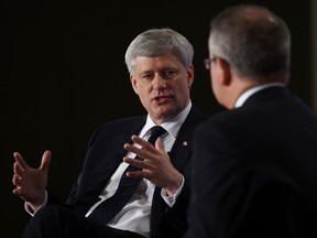 Conservative  leader Stephen Harper takes part in a question and answer session with Dan Kelly of the Canadian Federation of Independent Business (CFIB) as he makes a campaign stop in London, Ontario, on Wednesday, August 19, 2015.  THE CANADIAN PRESS/Sean Kilpatrick