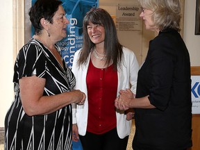 Donna Segal, left, chair of the Southeast Local Health Intergration Network speaks with Kingston and the Islands MPP Sophie Kiwala and Kingston General Hospital president and CEO Leslee Thompson after Kiwala announced at Kingston General Hospital in Kingston on Tuesday August 18 2015 over $8 million in funding for infrastructure projects for KGH, Hotel Dieu Hospital and Providence Care. Ian MacAlpine/Kingston Whig-Standard/Postmedia Network.