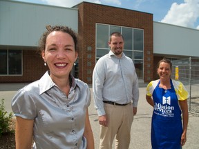 Connie Spuria, left, new store manager; Burton Haggith and assistant manager Michele Senese show off the future home of Mission Services? thrift store and head office at 797 York St.