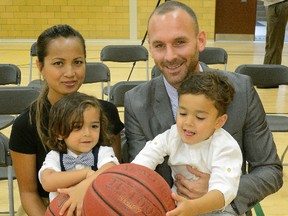 MORRIS LAMONT / THE LONDON FREE PRESS
The son of a coach himself, Kyle Julius had his family ? wife Yean and sons Matteo, 2, left, and Marcus, 4 ? with him for his introduction as the London?s new head coach at the Lightning?s training centre on Wednesday.