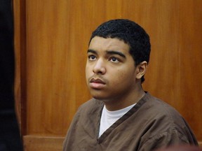 Marc Wabafiyebazu, 15, of Ottawa, is seen in court during his bail hearing in Miami on Friday, May 29, 2015. A Canadian diplomat's teenage son charged in a double killing in Florida that left his older brother dead is now expected to be tried in November at the earliest. THE CANADIAN PRESS/Colin Perkel