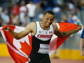 Canadian Andre De Grasse wins gold in the 100M final during the Pan American Games at the CIBC Athletic Centre in Toronto on July 22, 2015. (Stan Behal/Toronto Sun/Postmedia Network)