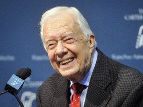 Former U.S. president Jimmy Carter takes questions from the media during a news conference about his recent cancer diagnosis and treatment plans, at the Carter Center in Atlanta, Ga., on Aug. 20, 2015. (REUTERS/John Amis)