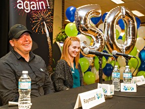 Raymond and Sheena Scott answer questions after winning $50 million in the Lotto Max at the AGLC building in St. Albert, Alta. on Thursday, Aug. 20, 2015. Codie McLachlan/Edmonton Sun