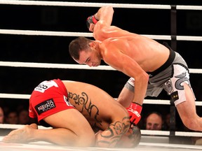 Edmonton's Shane Campbell, right, defeats Marcus Edwards, fighting out of Littleton, Colorado, via technical knockout (TKO) at MFC: 41 All In at the Shaw Conference Centre in Edmonton, AB on Friday October 3, 2014. TREVOR ROBB/EDMONTON SUN/POSTMEDIA NETWORK