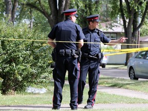 Police investigates a suspicious death at the corner of 108 Ave and 108 Street in Edmonton,, Alberta on Thursday, August 20, 2015. Perry Mah/Edmonton Sun/Postmedia Network