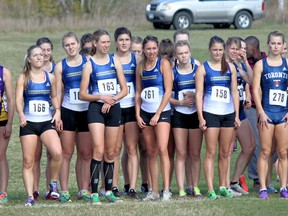 The Laurentian Voyageurs women's cross-country running team sets up at the starting line at an OUA event last year. The LU track team has grown this season with the addition of a men's cross-country team and a sprint team.