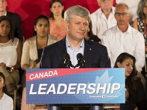 Canada's Prime Minister Stephen Harper speaks during a campaign stop at the WaterStone Estate and Farms in King Township, Ontario, August 20, 2015.  Harper announced policies that would provide tax relief for adoptive families if he is re-elected in the federal election on October 19.    REUTERS/Mark Blinch