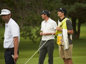 Ottawa Senator Mark Stone (right) caddies for Matt Hill at the National Capital Open to Support Our Troops at Hylands Golf Club. (National Capital Open photo)