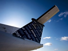 The tail of a Porter Airlines Bombardier Q400 turboprop aircraft is seen in Toronto, in this February 23, 2009 file photo. Regulators threatened to ground Canada's Porter Airlines over safety problems in 2008, according to documents reviewed by Reuters, but the matter was kept secret for years - a sign, some critics say, of how little the public is told about the safety of Canadian airlines.  REUTERS/Mark Blinch/Files