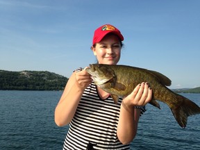 Sudbury's Camryn Heidman shows a nice late summer smallmouth bass. Star columnist John Vance writes about where to find fish in the warm waters of late summer.