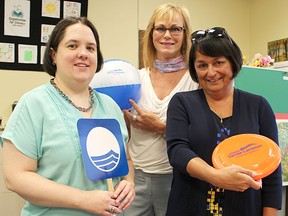 The Organization for Literacy in Lambton, Tourism Sarnia-Lambton, and the County of Lambton are teaming up to offer a writing contest, designed to promote area beaches, literacy and the Lambton County Discoveries that Matter brand. Pictured are OLL's Noelle Fisher, left, TSL's Marlene Wood, and county Warden Bev MacDougall at the OLL office in Sarnia. Tyler Kula/Sarnia Observer/Postmedia Network