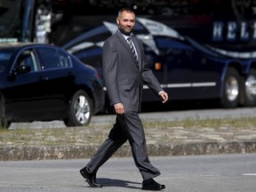Benjamin Perrin, former legal adviser to Canadian Prime Minister Stephen Harper, arrives at the courthouse in Ottawa, Canada August 21, 2015. (REUTERS/Chris Wattie)