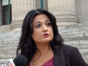 Manitoba Liberal leader Rana Bokhari speaks with media on electoral reform outside the legislature Friday, Aug. 21, 2015.