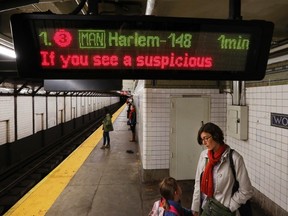 A warning message on suspicious activity flashes on a New York City subway electronic message board April 16, 2013. (REUTERS/Brendan McDermid)
