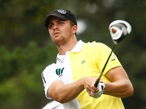 Denmark’s Andreas Harto watches his shot during the first round of the U.S. Open at Congressional Country Club in Bethesda, Maryland, June 16, 2011. (REUTERS/Kevin Lamarque)