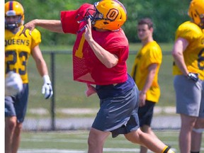Quarterback Nate Hobbs throws a pass during Queen’s Golden Gaels training camp this week. (Queen’s University Athletics)