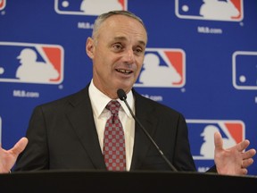 Major League Baseball Commissioner Rob Manfred speaks to the media after the owners meetings, Thursday, Aug 13, 2015, in Chicago. (AP Photo/Paul Beaty)