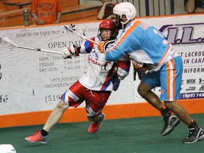 Turner Evans tries to get around Six Nations Chiefs defender Billy Dee Smith Friday during Game 3 of the Major Series Lacrosse final at the Iroquois Lacrosse Arena. PHOTO BY SIX NATIONS CHIEFS